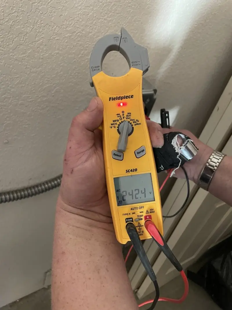 Voltage testing with clamp meter during Aluminum Wiring Replacement in Lakeville